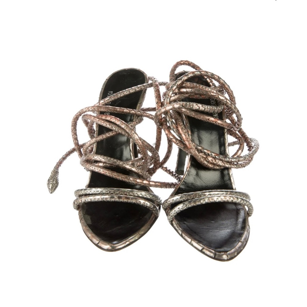 These Roberto Cavalli snake shoes wrap up around the leg and around the ankle